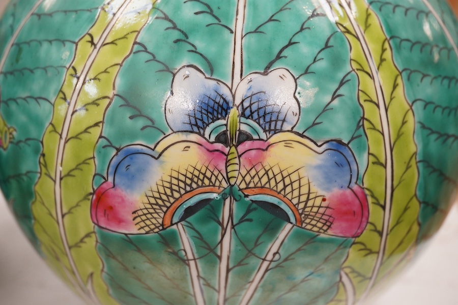 A pair of modern Chinese leaf and butterfly decorated bottle vases, 37cm high. Condition - good